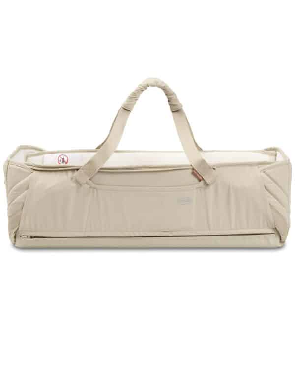 Voksi Carry Me Seashellsand Cream vue de face avec anses de transport